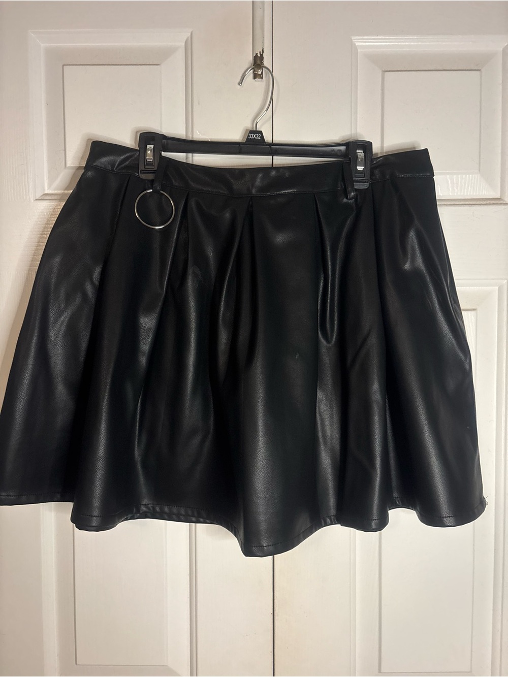 Black Faux Leather A-Line Skirt with Ring Accent